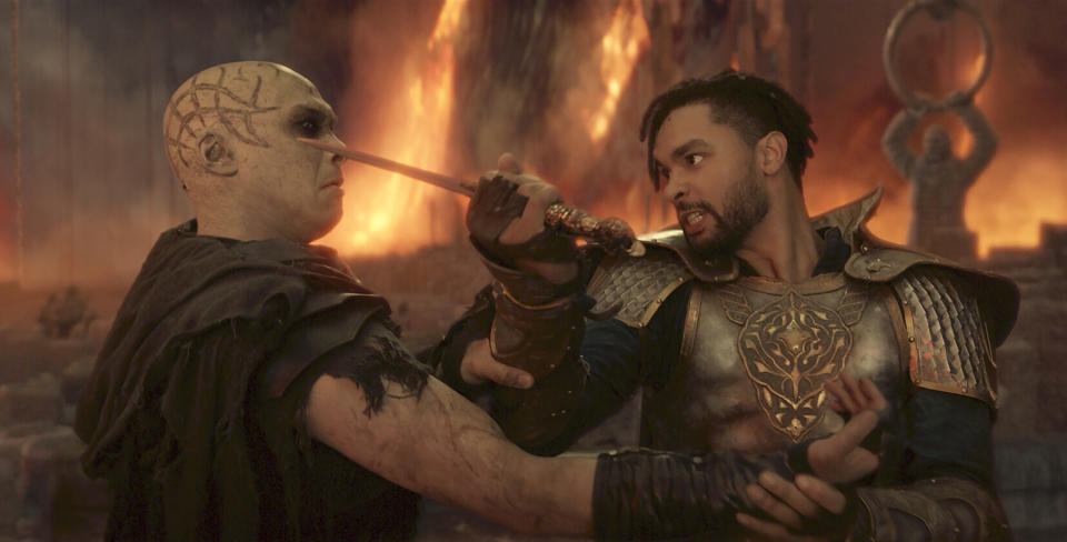 This image released by Paramount Pictures shows Jason Wong, left, and Rege-Jean Page in a scene from "Dungeons & Dragons: Honor Among Thieves." (Paramount Pictures via AP)