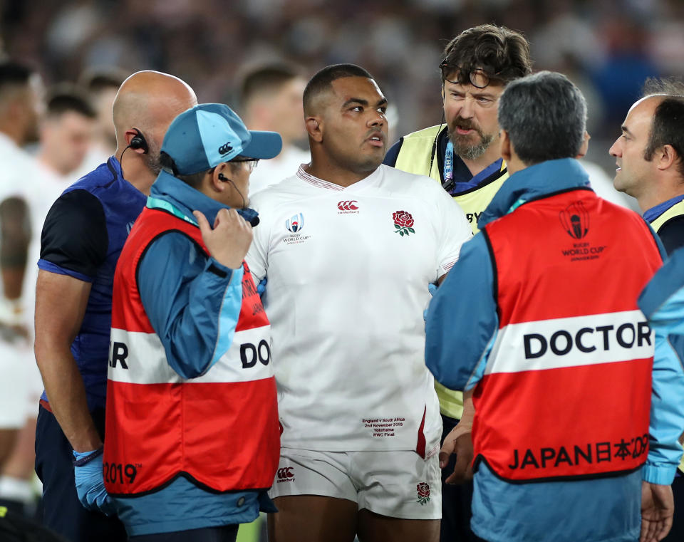 YOKOHAMA, JAPAN - NOVEMBER 02: Kyle Sinckler of England is helped off the pitch after receiving treatment during the Rugby World Cup 2019 Final between England and South Africa at International Stadium Yokohama on November 02, 2019 in Yokohama, Kanagawa, Japan. (Photo by David Rogers/Getty Images)