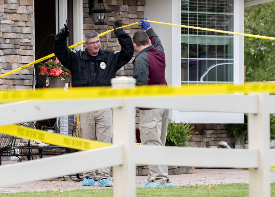 Investigators work on the scene of an Upper Makefield home where two boys, 10 and 13 years old, were shot May 2, 2022. Their mother,  Trinh Nguyen, was arrested and charged in the shooting, according to Bucks County District Attorney Matthew Weintraub.