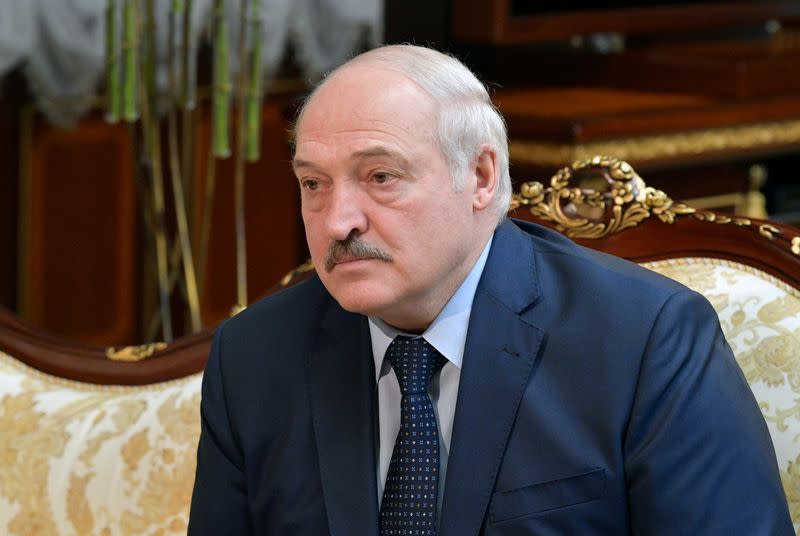 FILE PHOTO: Belarusian President Lukashenko meets Russian Prime Minister Mishustin in Minsk