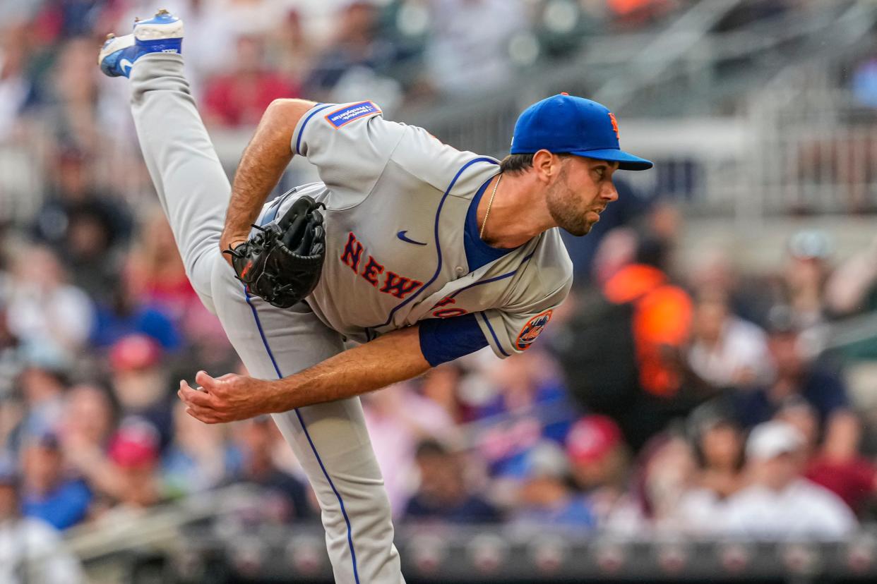 Aug 21, 2023; Cumberland, Georgia, USA; New York Mets starting pitcher David Peterson (23) pitches against the Atlanta Braves during the first inning at Truist Park. Mandatory Credit: Dale Zanine-USA TODAY Sports