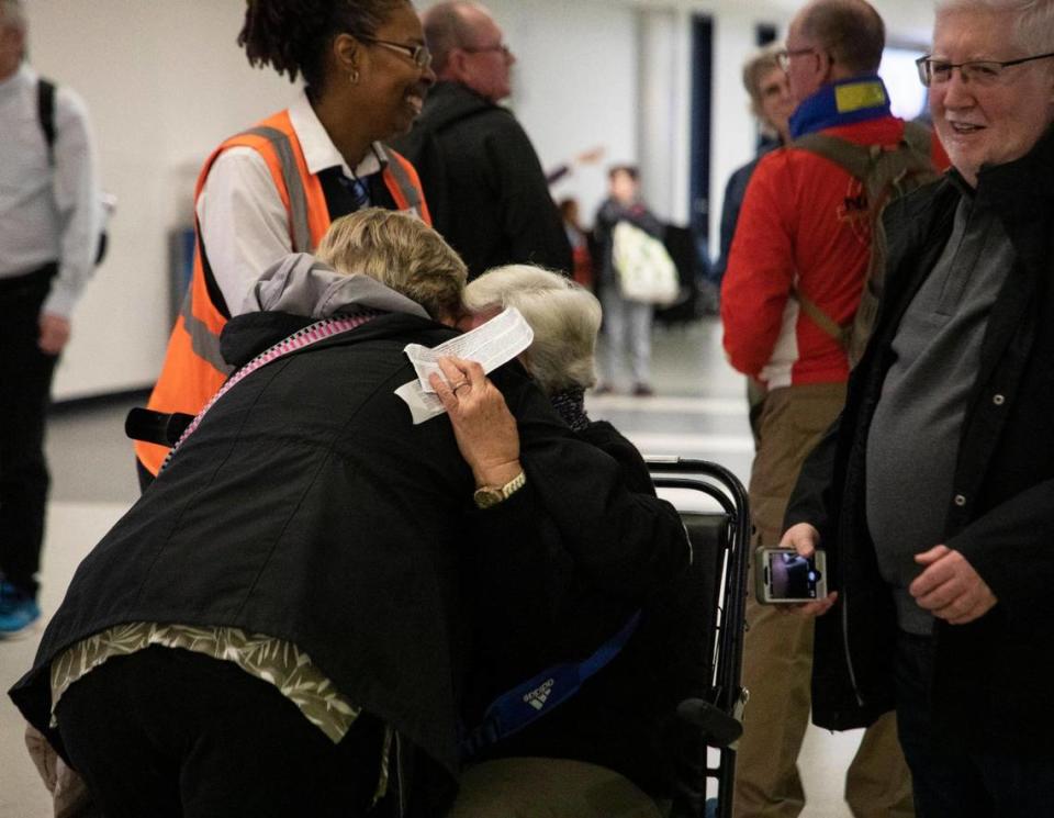 After hours of delays Lilly Padron and childhood Terry Diego reunited at baggage claim after over 60 years apart.