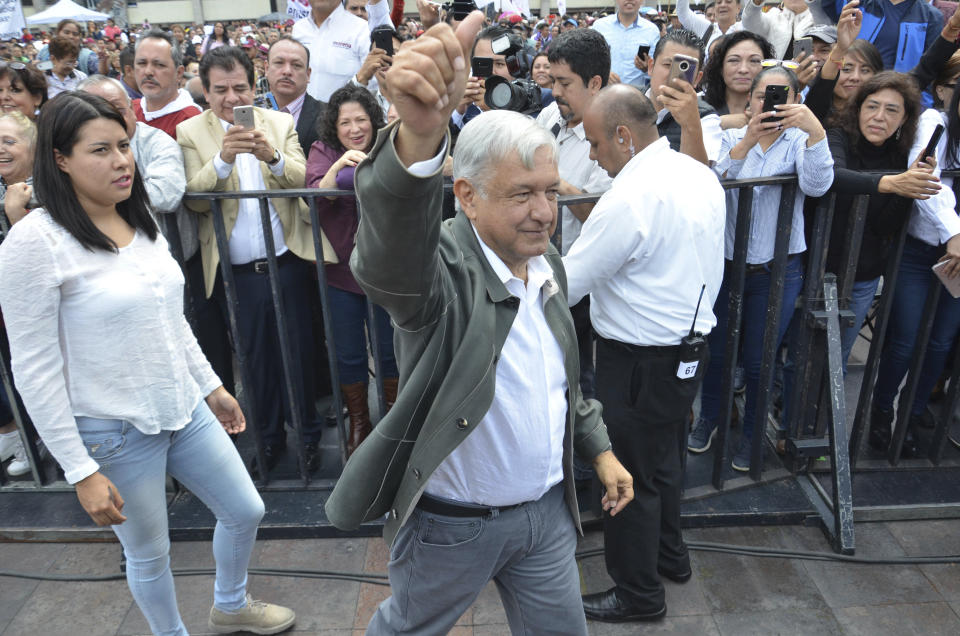 Mexico's President-elect Andres Manuel Lopez Obrador arrives to a rally commemorating the 50th anniversary of a bloody reprisal against students, at the Tlatelolco Plaza in Mexico City, Saturday, Sept. 29, 2018. Lopez Obrador vowed Saturday to never use military force against civilians. Troops fired on a peaceful demonstration at the plaza on Oct. 2, 1968, killing as many as 300 people at a time when leftist student movements were taking root throughout Latin America. (AP Photo/Christian Palma)