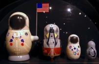 Matrioshka dolls depicting American astronaut Neil Armstrong as the first person to walk on the moon can be seen on display during an exhibition showcasing the story of the space race through Russian Matrioshka dolls at the Samara Space Museum in Samara, Russia, June 22, 2018. REUTERS/David Gray