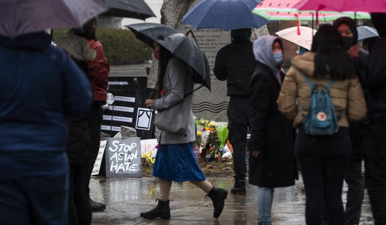 <span class="caption">Community members gather for a vigil in memory of the victims of the Atlanta shootings and to rally against anti-Asian racism in Ottawa.</span> <span class="attribution"><span class="source">THE CANADIAN PRESS/Justin Tang</span></span>