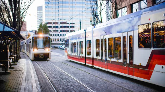 The MAX: Rail train cars coming and going on their tracks in downtown Portland city.