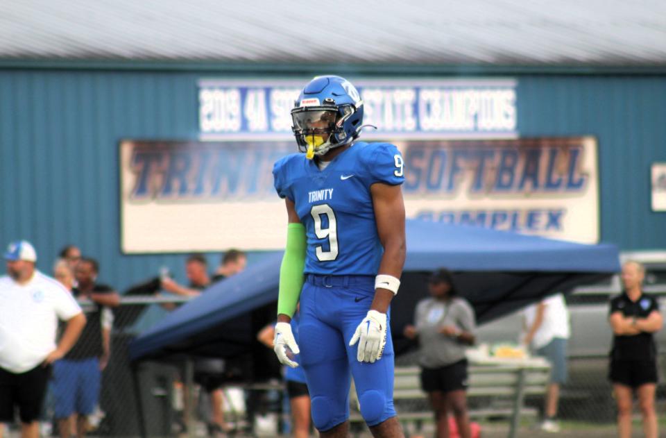 Trinity Christian ATH Kyle Boylston looks toward a teammate during warmups.