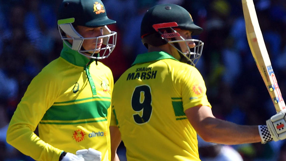 Peter Handscomb and Shaun Marsh both made half-centuries. (Photo by SAEED KHAN/AFP/Getty Images)