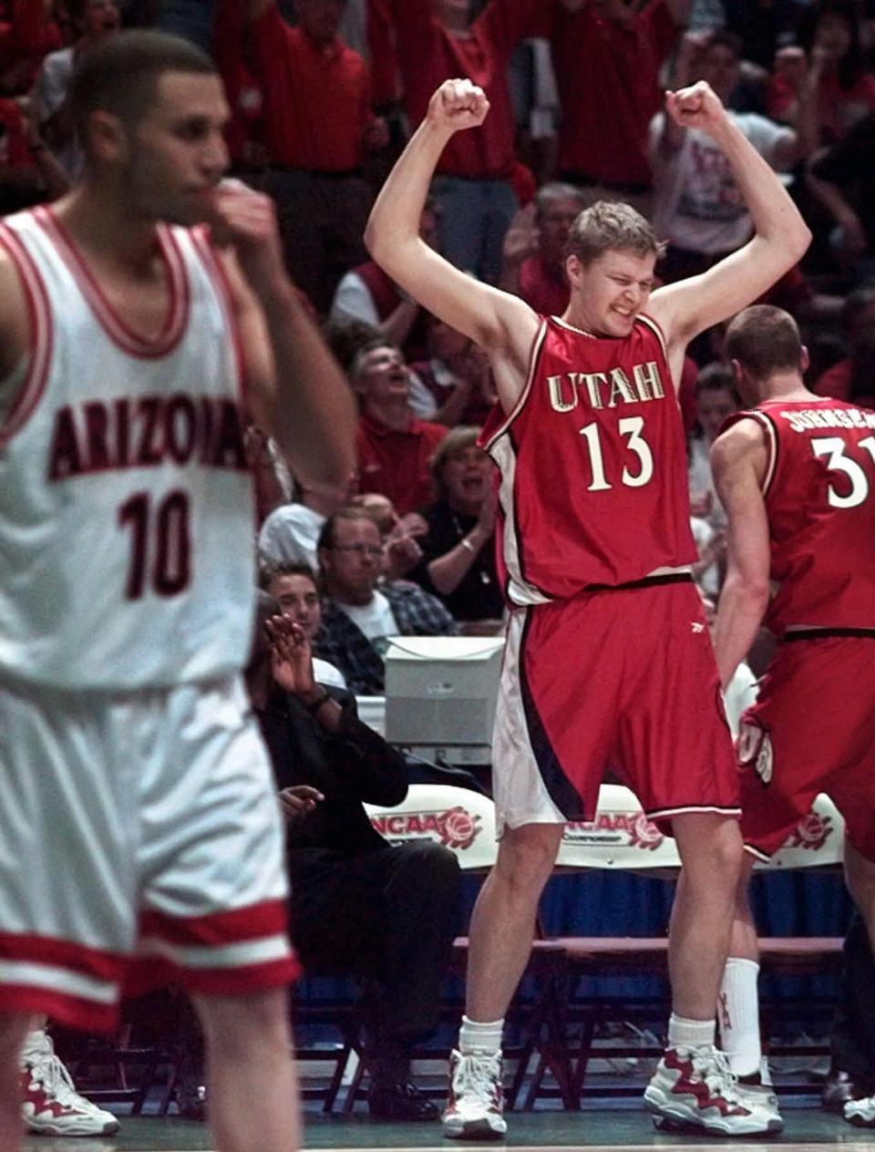 FILE - In this March 21, 1998, fie photo, Utah's Hanno Mottola celebrates as the final seconds run out in Utah's win over Arizona in the NCAA West Regional final at the Arrowhead Pond in Anaheim, Calif. Utah defeated Arizona 76-51. Nobody expected Utah to wallop reigning national champion and No. 1 seed Arizona when they met in the Elite Eight of the 1998 tournament. (AP Photo/Mark J. Terrill, File)