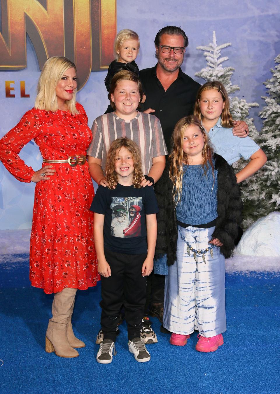 Tori Spelling, Dean McDermott and their children arrive for the world premiere of "Jumanji: The Next Level" in 2019.