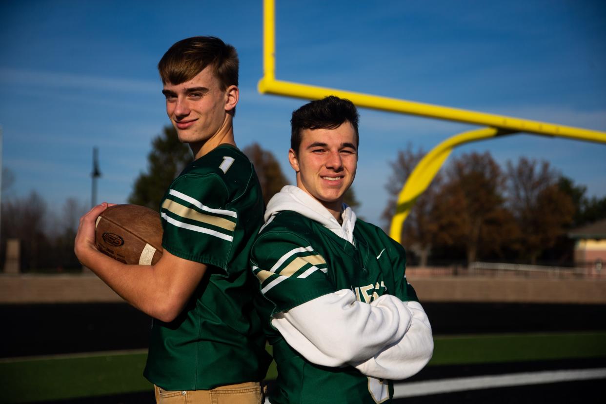 West's Skyler Geurink and Parker Holman pose for a portrait Tuesday, Nov. 29, 2022, at Zeeland Stadium. The two have been named the Sentinel's Football Players of The Year. 