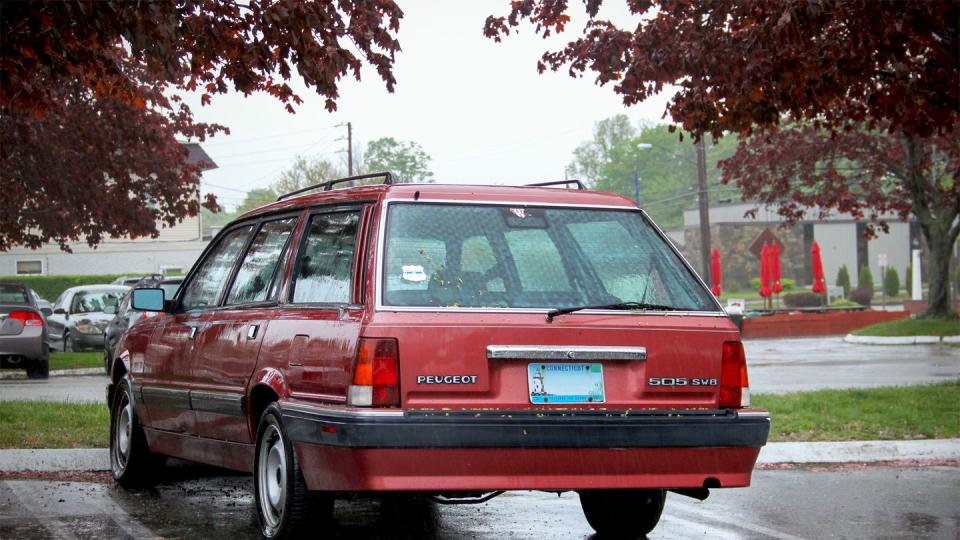 a red car parked in a parking lot