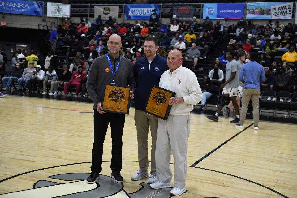 Elkins head coach Amrit Rayfield (left), Governor's Challenge Director James Simmons (middle), and Wicomico head coach Butch Waller (right) were honored before the final game of Day 2. Rayfield is the son of longtime Crisfield head coach Phil Rayfield.