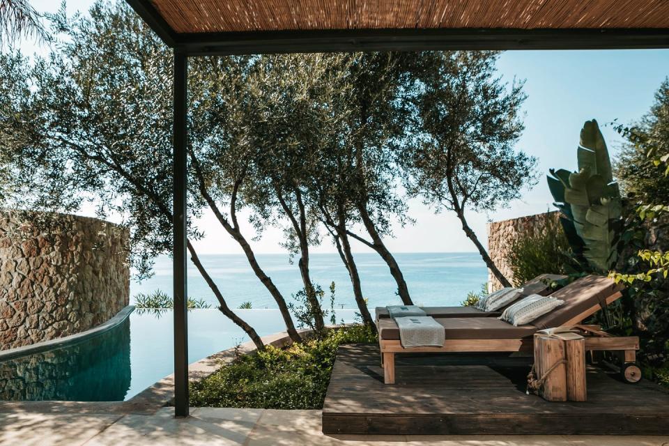 <p>Days at this shiny retreat on the shores of Kefalonia are likely to feature yoga on a foliage-fringed deck, film nights with new friends at the outdoor cinema, meditation sessions and guided hikes; even working out isn’t a burden, thanks to the view at the outdoor gym. </p><p>If that sounds a little too wholesome for your usual holiday liking, don’t worry: <a href="https://www.booking.com/hotel/gr/ionian-sun.en-gb.html?aid=2200764&label=hotels-private-pools-greece" rel="nofollow noopener" target="_blank" data-ylk="slk:F Zeen;elm:context_link;itc:0;sec:content-canvas" class="link ">F Zeen</a> also offers free-flowing cocktails on the beach, sun loungers ready to sequester right by an Ionian-facing infinity pool and two restaurants that make the most of that coastal setting.</p><p><a class="link " href="https://www.booking.com/hotel/gr/ionian-sun.en-gb.html?aid=2200764&label=hotels-private-pools-greece" rel="nofollow noopener" target="_blank" data-ylk="slk:CHECK AVAILABILITY;elm:context_link;itc:0;sec:content-canvas">CHECK AVAILABILITY</a></p>