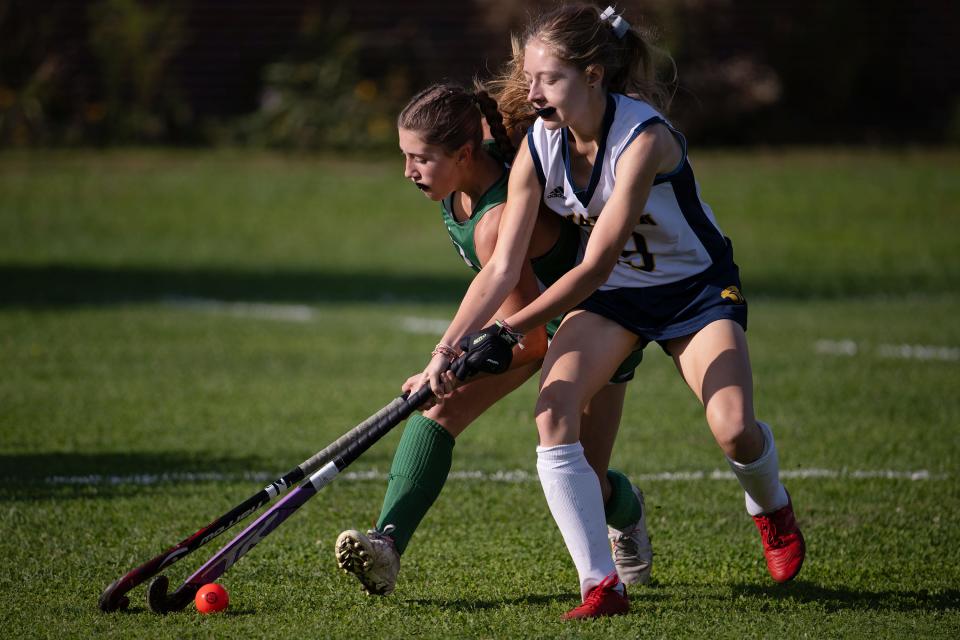 Sutton's Leah Medeiros and Quabbin's Annabelle Magill battle for possession during Tuesday's game.