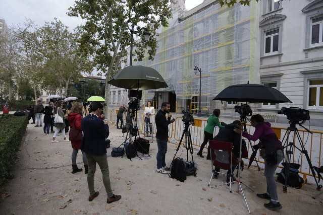 Journalists waiting outside the court