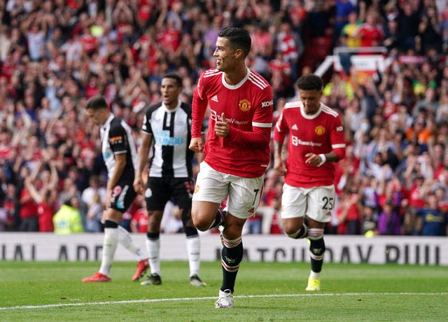 Cristiano Ronaldo celebrates scoring against Newcastle on his second debut for Manchester United