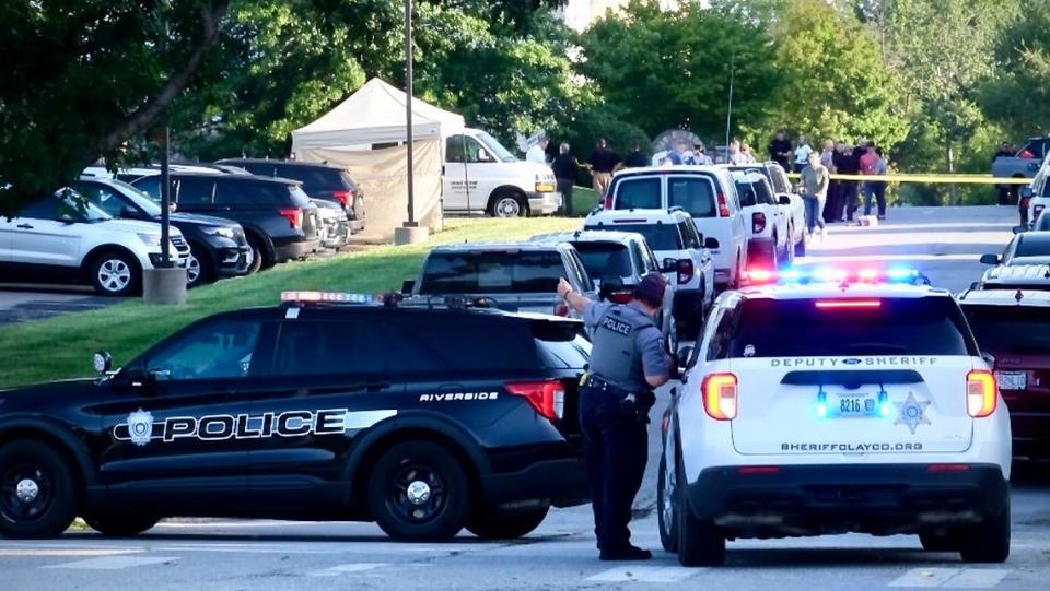 A Gladstone officer fatally shot a suspected car burglar after the suspect allegedly dragged the officer while attempting to flee in a car early Friday at the Englewood Vista apartments near North Main Street and Englewood Trafficway.