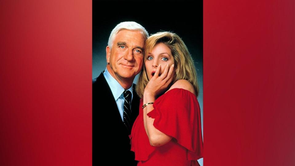 PHOTO: Leslie Nielsen and Priscilla Presley are show in a promo photo for the 1988 movie 'The Naked Gun.' (Moviestore/Shutterstock)