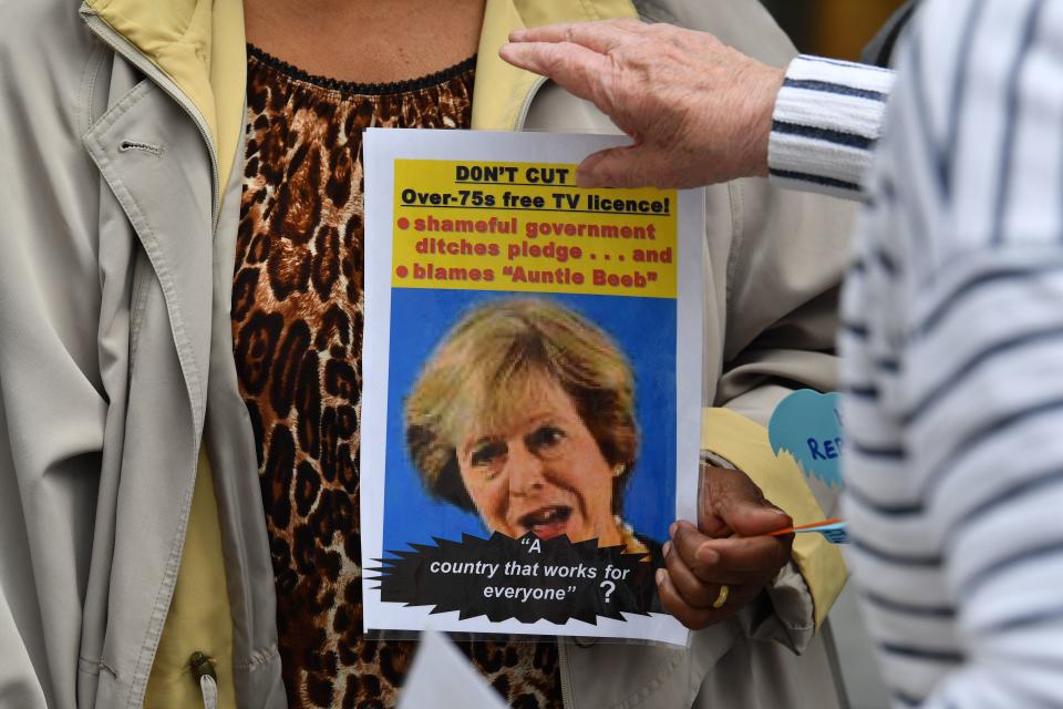 Senior citizens protest outside the BBC studios in London on June 21, 2019 against the end of government funding for free TV licenses for the over 75s. - Funding the free licences is due to be transferred from the Government to the BBC in 2019 as part of an agreement hammered out in 2015. The BBC has said that funding the universal scheme would mean the closure of BBC Two, BBC Four, the BBC News Channel, the BBC Scotland channel, Radio 5 Live, and a number of local radio stations. (Photo by Ben STANSALL / AFP)        (Photo credit should read BEN STANSALL/AFP/Getty Images)