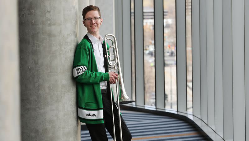 Austin Wages, a Provo High student, poses in Salt Lake City on Thursday, March 23, 2023, and plays trombone with the Caleb Chapman Crescent Super Band. He is one of this year’s 238 Daniels scholarship winners.