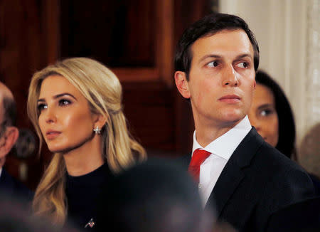 FILE PHOTO -- Ivanka Trump and her husband Jared Kushner watch as German Chancellor Angela Merkel and U.S. President Donald Trump hold a joint news conference in the East Room of the White House in Washington, U.S., March 17, 2017. REUTERS/Jim Bourg/File Photo