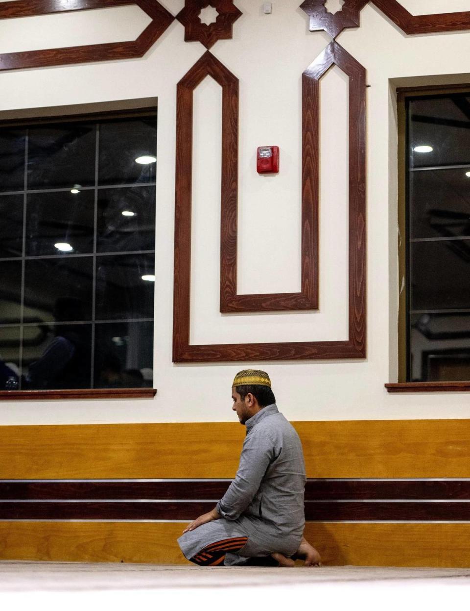 A man prays during the Islamic night prayer known as Isha for Ramadan at the Islamic Society of Greater Kansas City on Monday, April 10, 2023, in Kansas City.