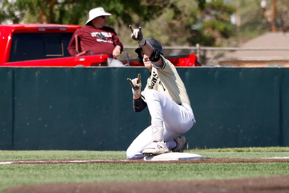 Bushland’s Josh Bass (7) celebrates a hit during an area round series baseball game against Littlefield on Friday, May 13, 2022, in Lubbock, Texas.