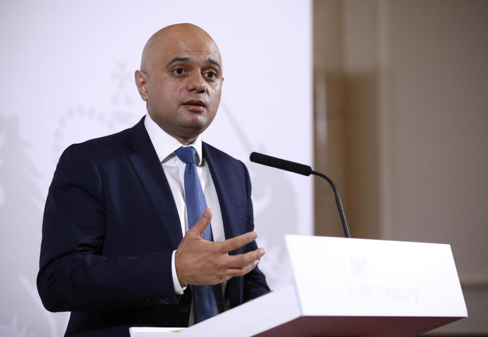 Britain's Chancellor of the Exchequer Sajid Javid delivers a statement at The Treasury in London, Friday Dec. 20, 2019. Sajid Javid announced that Andrew Bailey, head of Britain’s financial watchdog, will be the next governor of the Bank of England, replacing Mark Carney from March 15, 2020. (Tom Nicholson/Pool via AP)