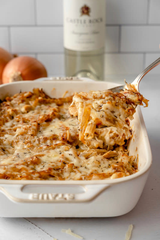 <p>Balance With Jess</p><p>This pasta cake is smothered with homemade caramelized onions and topped with melty Gruyere cheese to create a delicious sweet and savory casserole. Talk about cozy!</p><p><strong>Get the recipe: <a href="https://balancewithjess.com/french-onion-chicken-pasta-bake" rel="nofollow noopener" target="_blank" data-ylk="slk:French Onion Chicken Penne Pasta Bake;elm:context_link;itc:0;sec:content-canvas" class="link ">French Onion Chicken Penne Pasta Bake</a></strong></p>