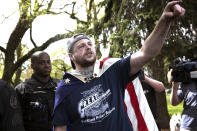 <p>Jeremy Joseph Christian, right, is seen during a Patriot Prayer organized by a pro-Trump group in Portland, Ore. (John Rudoff via AP) </p>