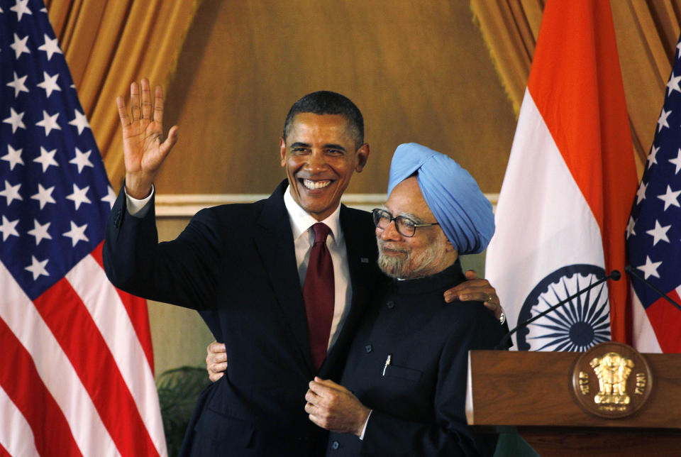 FILE - In this Nov. 8, 2010, file photo, U.S. President Barack Obama, left, and Indian Prime Minister Manmohan Singh embrace following a joint statement and press conference at Hyderabad House in New Delhi, India. Indian elections results due Friday, May 16, 2014, provide a chance to repair relations with the U.S. that were strained by the arrest of an Indian diplomat in New York. But there's a big catch: Washington's uneasy relationship with the man expected to become India's next prime minister. Hindu nationalist leader Narendra Modi was in 2005 denied a U.S. visa for alleged complicity in religious riots in 2002 that killed more than 1,000 Muslims. Exit polls show his Bharatiya Janata Party and its allies with a large lead over the ruling Congress party and its allies after voting ended Monday, May 12. Obama also emphasized ties with India, the world's largest democracy when visited New Delhi in 2010 and declared the U.S.-India relationship would be a "defining partnership of the 21st century." (AP Photo/Saurabh Das, File)