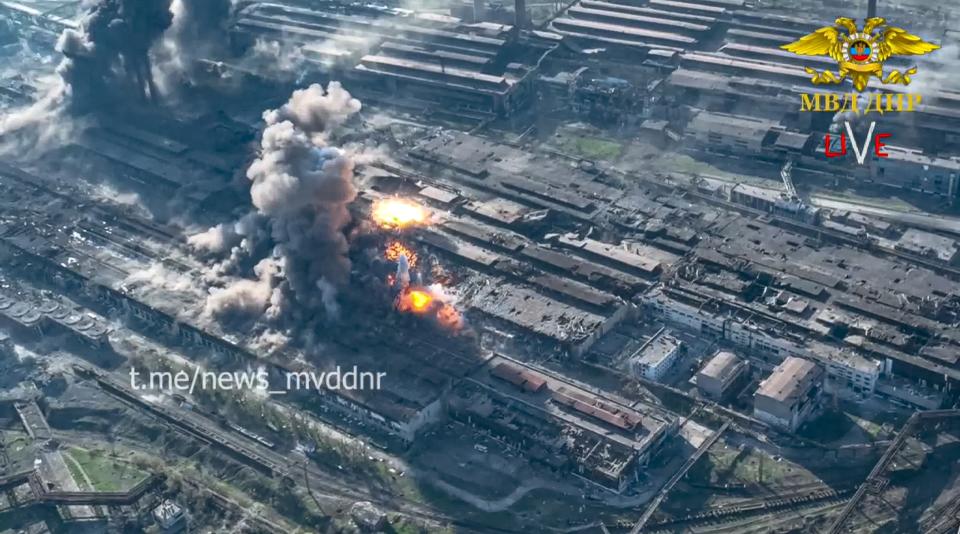 In this handout photo taken from video released on Wednesday, May 4, 2022 by Donetsk People's Republic Interior Ministry Press Service, Smoke rises from the Metallurgical Combine Azovstal in Mariupol, in territory under the government of the Donetsk People's Republic, eastern Ukraine. Heavy fighting is raging at the besieged steel plant in Mariupol as Russian forces attempt to finish off the city's last-ditch defenders and complete the capture of the strategically vital port. (Donetsk People's Republic Interior Ministry Press Service via AP)