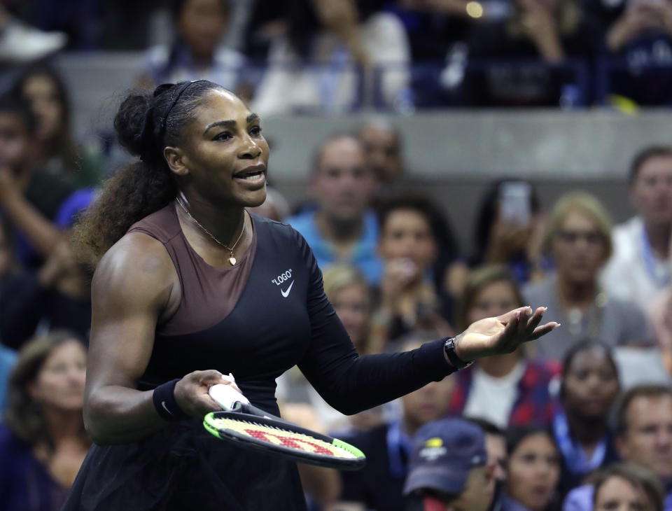 Serena Williams looks at her box during the women's final of the U.S. Open tennis tournament against Naomi Osaka, of Japan, Saturday, Sept. 8, 2018, in New York. (AP Photo/Julio Cortez)