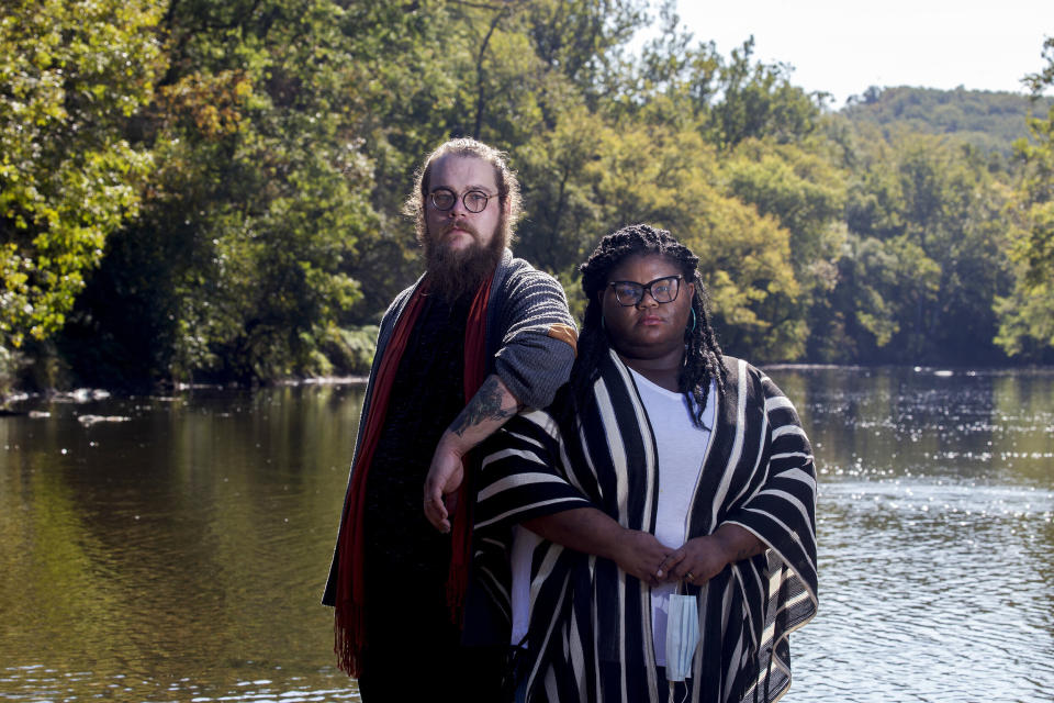 Kitzo-Creed and her husband Aaron stand in the middle of Brandywine Creek at the First State National Historic Park in Wilmington, Delaware, on Oct. 9, 2020. The park is one of the few places they feel comfortable visiting as political tensions and rates of COVID-19 rise in the United States.  (Photo: Meredith Edlow for HuffPost)