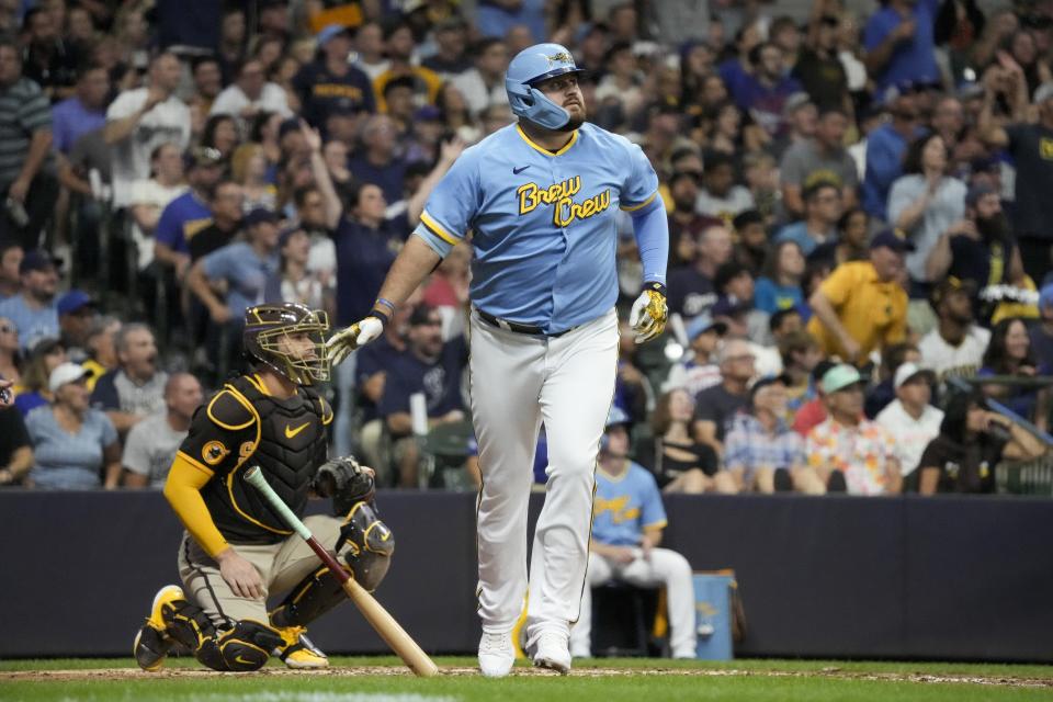 Milwaukee Brewers' Rowdy Tellez hits a three-run home run during the third inning of a baseball game against the San Diego Padres Friday, Aug. 25, 2023, in Milwaukee. (AP Photo/Morry Gash)