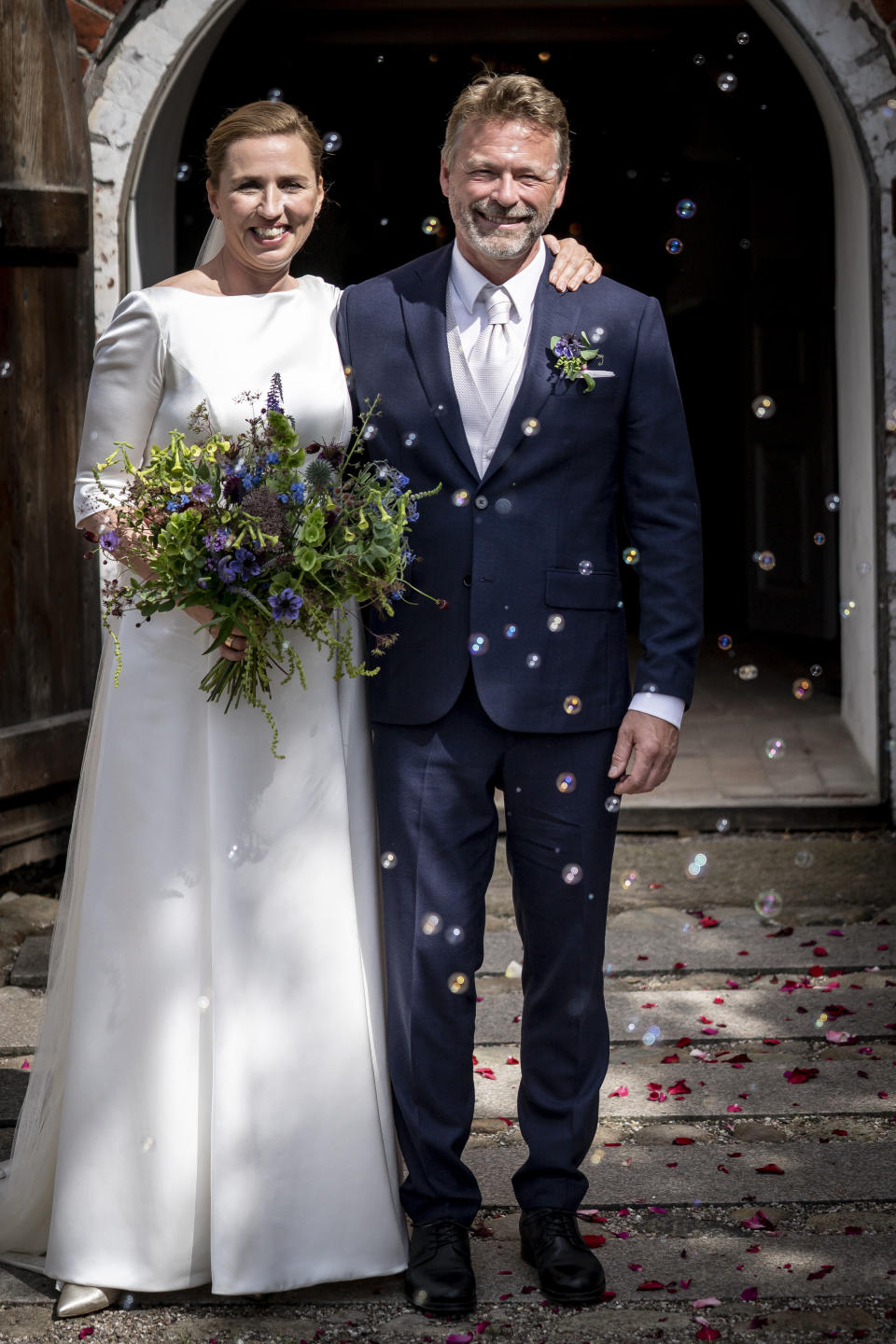 Denmark's Prime Minister Mette Frederiksen marries Bo Tengberg in Magleby Church on Zealand, Denmark, Wednesday July 15, 2020. (Mads Claus Rasmussen/Ritzau Scanpix via AP)