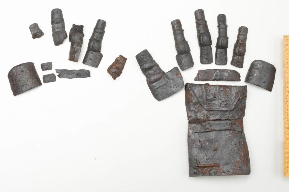 A 14th-century gauntlet of armor was discovered recently by archaeologists in Switzerland. / Credit: Canton of Zurich Construction Department