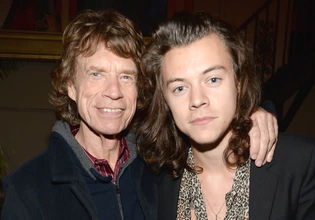 Mick Jagger poses with Harry Styles in 2015 at The Rolling Stones Los Angeles Club Show. (Photo: Kevin Mazur via Getty Images)