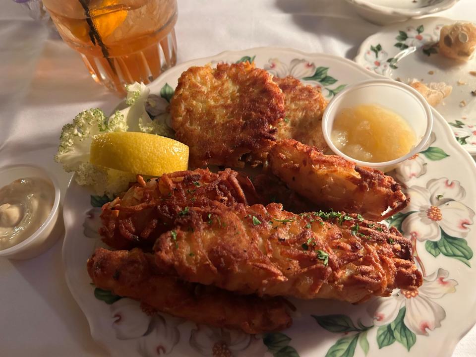 Jack Pandl's potato-crusted cod is served golden brown. The meal also comes with chowder, salad or coleslaw; house-made tartar sauce; and choice of potato or vegetable of the day.