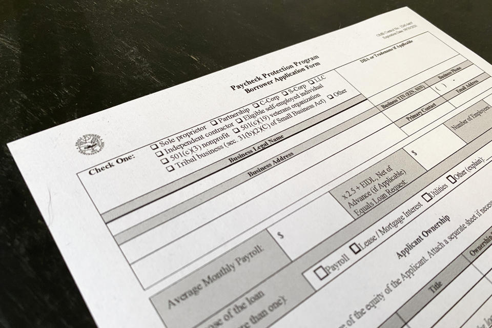 A page from the PPP loan application that people have to fill out for financial support due to the continuing outbreak of the coronavirus disease (COVID-19) is pictured on a desk in New York U.S., May 7, 2020. REUTERS/Lucas Jackson