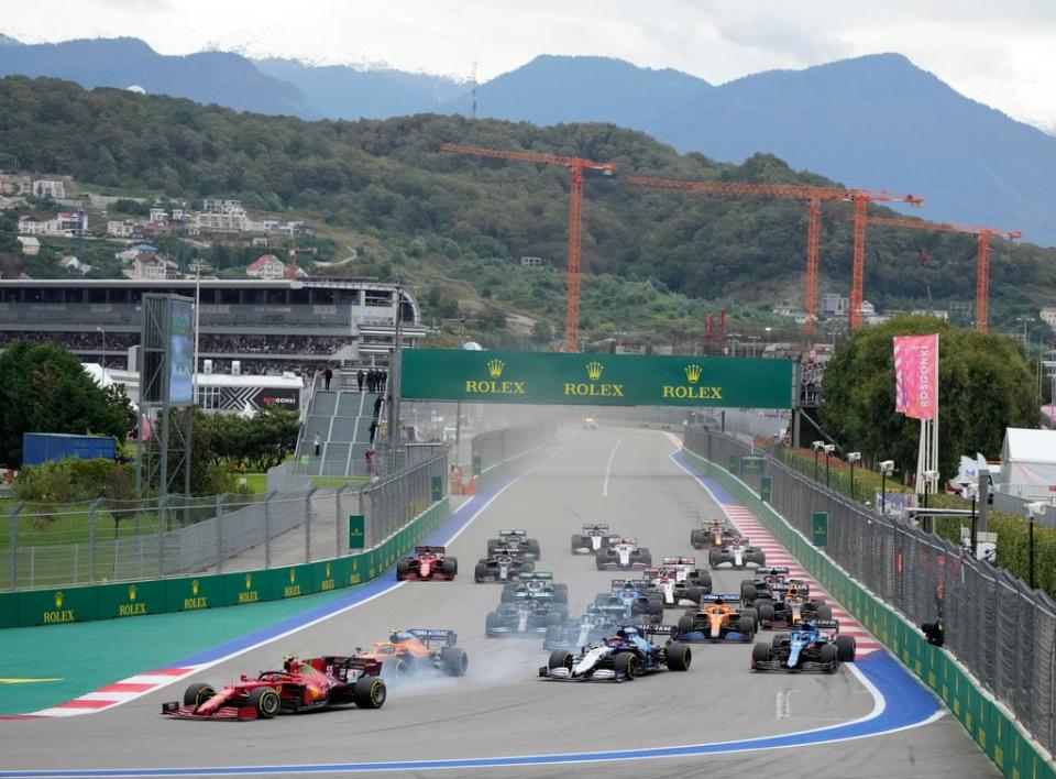 Ferrari’s Carlos Sainz Jr. leads into the first corner at the start of the Russian Formula One Grand Prix in Sochi (Sergei Grits/AP) (AP)