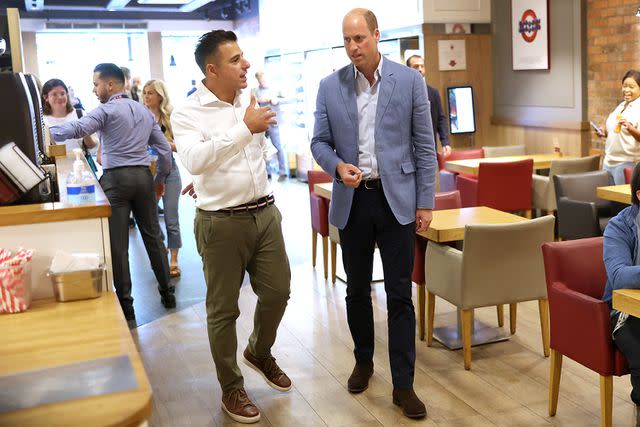 <p>Chris Jackson/Getty Images</p> Prince William chats with Pret CEO Pano Christou at Pret a Manger in Bournmouth