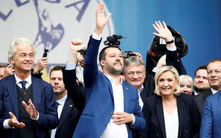 FILE PHOTO: Geert Wilders, leader of Dutch party PVV (Party for Freedom), Italy's Deputy Prime Minister Matteo Salvini, Marine Le Pen, leader of French National Rally party attend a major rally of European nationalist and far-right parties ahead of EU parliamentary elections in Milan, Italy May 18, 2019. REUTERS/Alessandro Garofalo/File Photo