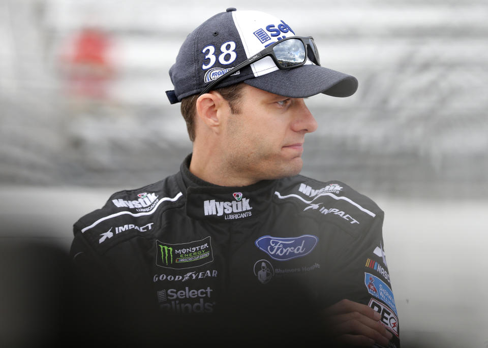 MARTINSVILLE, VIRGINIA - OCTOBER 26: David Ragan, driver of the #38 MDS Transport Ford, stands by his car during qualifying for the Monster Energy NASCAR Cup Series First Data 500 at Martinsville Speedway on October 26, 2019 in Martinsville, Virginia. (Photo by Brian Lawdermilk/Getty Images)