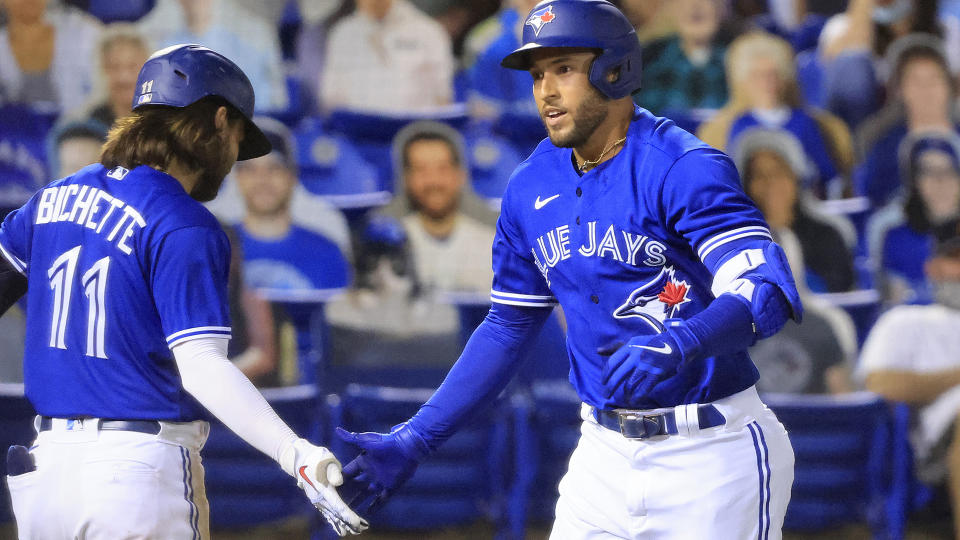 DUNEDIN, FLORIDA - MAY 01: George Springer #4 of the Toronto Blue Jays celebrates a home run with Bo Bichette #11 in the seventh inning against the Atlanta Braves at TD Ballpark on May 01, 2021 in Dunedin, Florida. (Photo by Sam Greenwood/Getty Images)