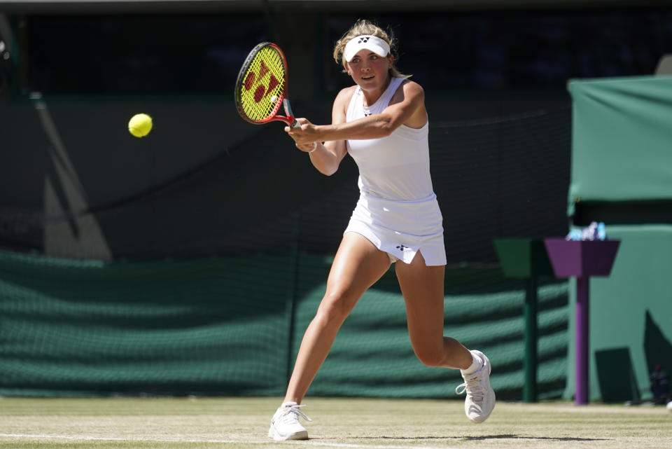 Liv Hovde of the United States returns to Hungary's Luca Udvardy in the final of the girls' singles on day thirteen of the Wimbledon tennis championships in London, Saturday, July 9, 2022. (AP Photo/Gerald Herbert)