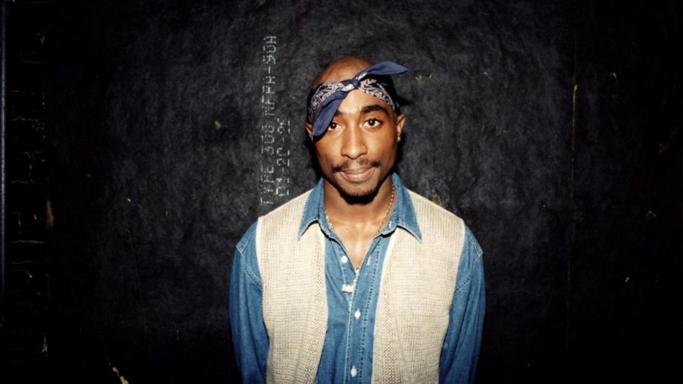 PHOTO: Tupac Shakur poses for photos backstage after his performance at the Regal Theater in Chicago, in March 1994.  (Raymond Boyd/Getty Images)