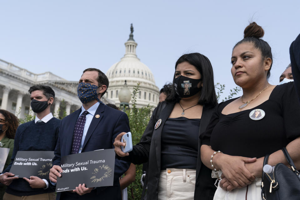 Lupe Guillén, second from right, and Gloria Guillén, right, Vanessa Guillén's sister and mother, listen during a news conference about the "I Am Vanessa Guillén Act," in honor of the late U.S. Army Specialist Vanessa Guillén, and survivors of military sexual violence, during a news conference on Capitol Hill, Wednesday, Sept. 16, 2020, in Washington. (AP Photo/Alex Brandon)