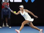 United States' Sofia Kenin makes a forehand return to Romania's Simona Halep during their second round match at the Australian Open tennis championships in Melbourne, Australia, Thursday, Jan. 17, 2019. (AP Photo/Aaron Favila)